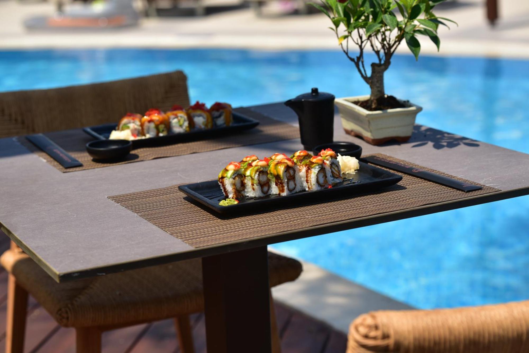 Miraggio Thermal Spa Resort Paliouri Exterior photo Sushi at the pool